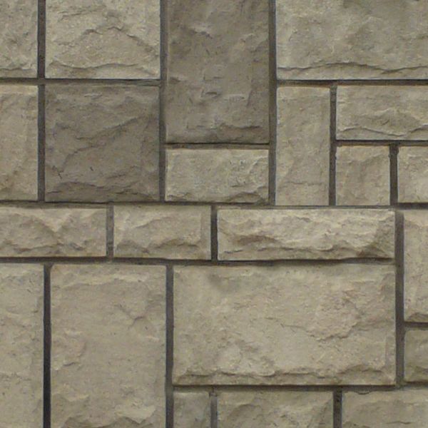 Patterned grey stone set in dark grey cement.